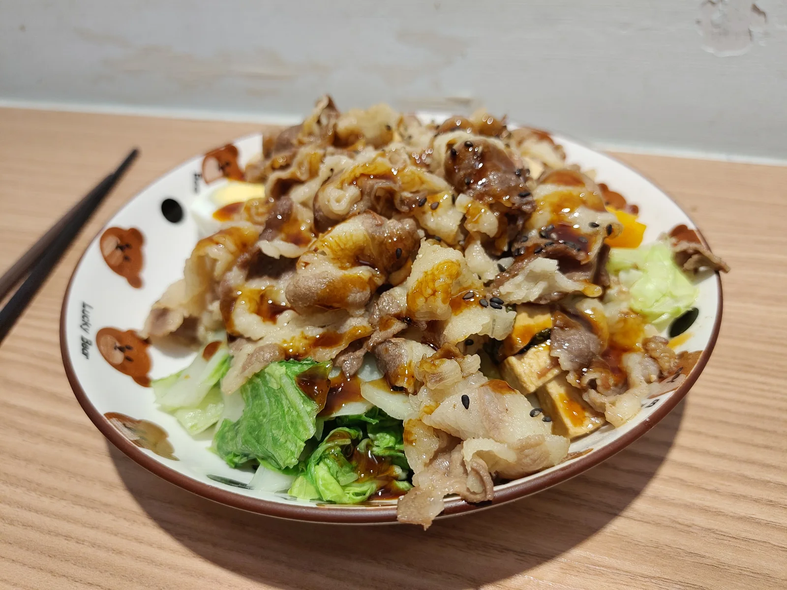Pork with black rice and teriyaki sauce