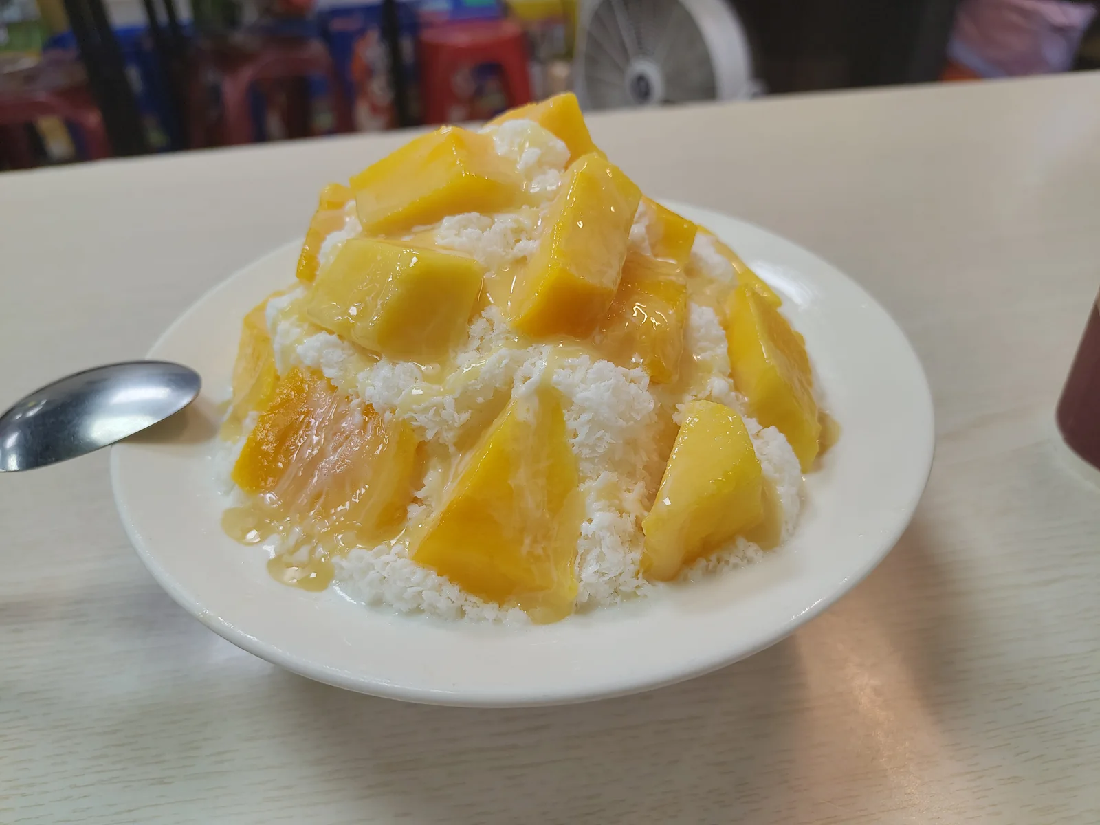 Mango shaved ice with condensed milk.