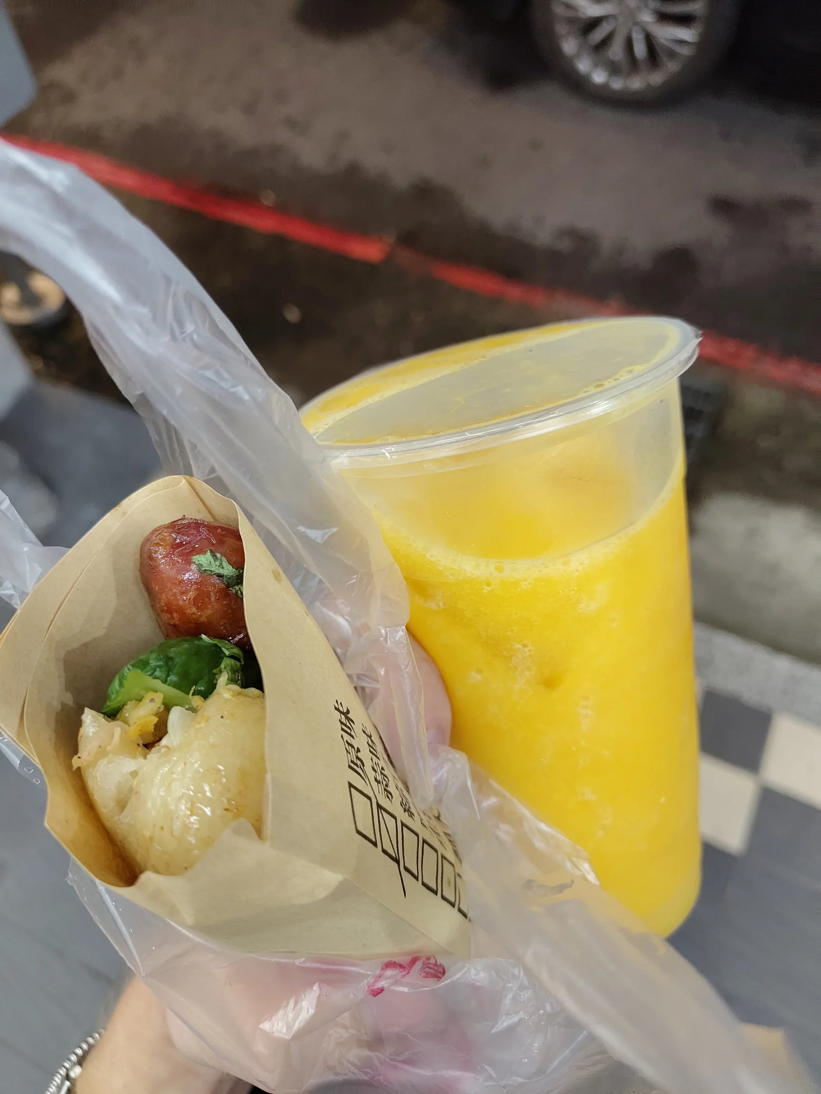 Taiwanese sausage with freshly made mango juice