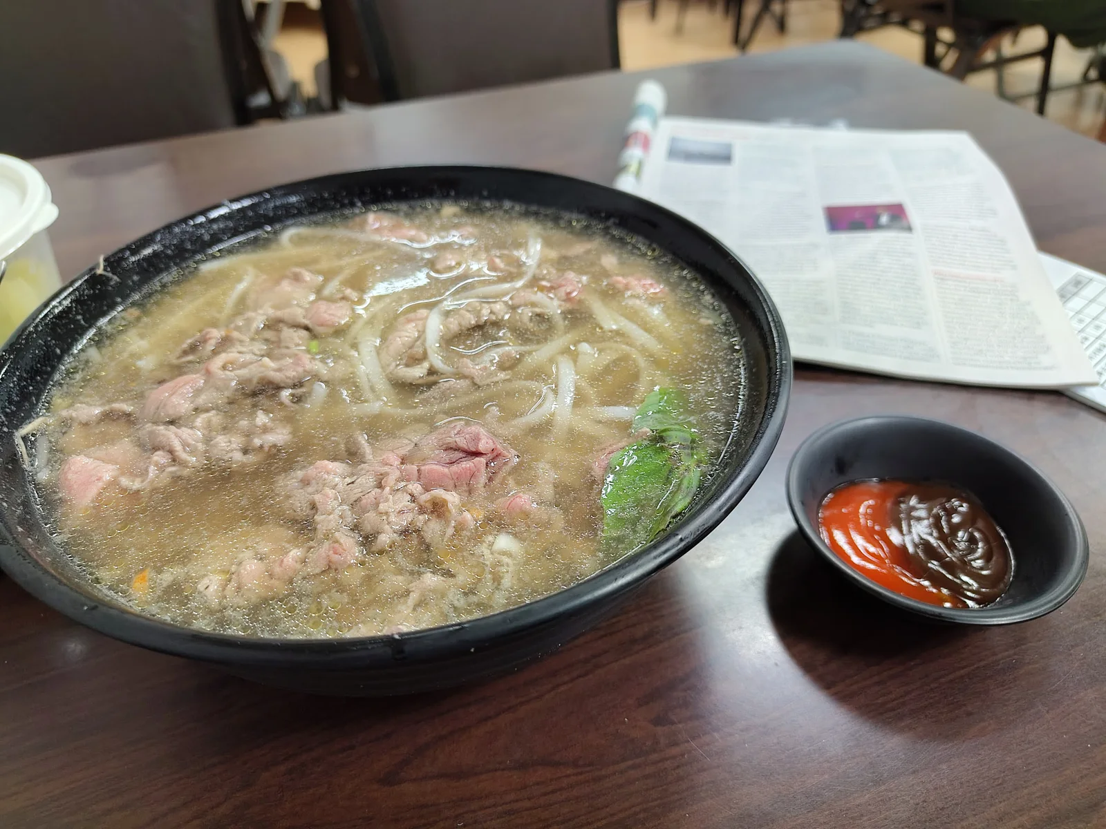 Vietnamese beef pho with The Economist