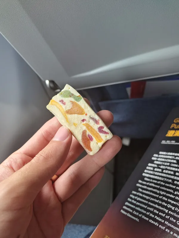 A small piece of Chinese fruit-filled candy.